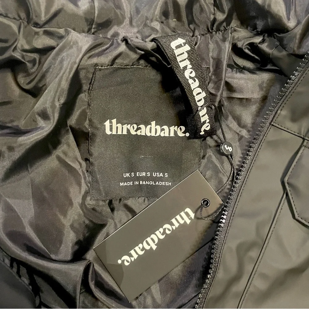 Threadbare rain jacket - Picture 3 of 3